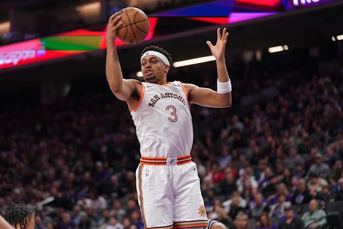 San Antonio Spurs forward Keldon Johnson (3) holds onto a rebound against the Sacramento Kings in the second quarter at the Golden 1 Center.